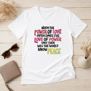 Official When The Power Of Love Overcomes The Love Of Power V Neck Shirt in black, featuring bold white text on a soft fabric
