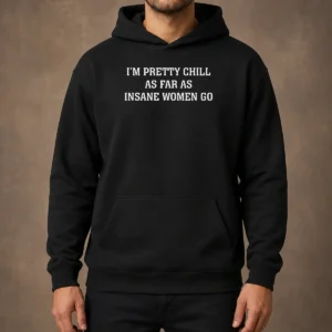 Hot I'M Pretty Chill As Far As Insane Women Go Hoodie in black, comfortable pullover with front pocket and bold graphic text