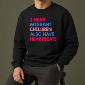 Top Nice I Hear Migrant Children Also Have Heartbeats Sweater in dark color, long sleeves, crew neck