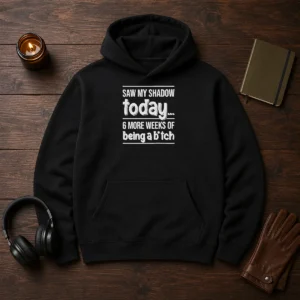 Funny Saw My Shadow Today 6 More Weeks Of Being A Bitch hoodie in charcoal gray with white and red print on front