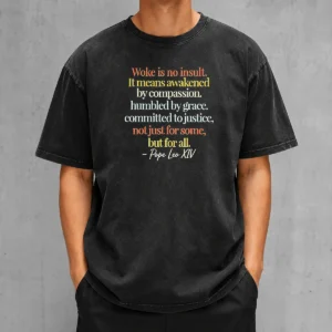 Premium Woke Is No Insult Pope Leo XIV Quote printed on a soft washed t shirt in neutral tones