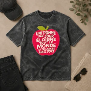 Premium Good Une Pomme Par Jour Eloigne Tout Le Monde Si Tu Lances Assez Fort Humor printed on a soft washed t shirt