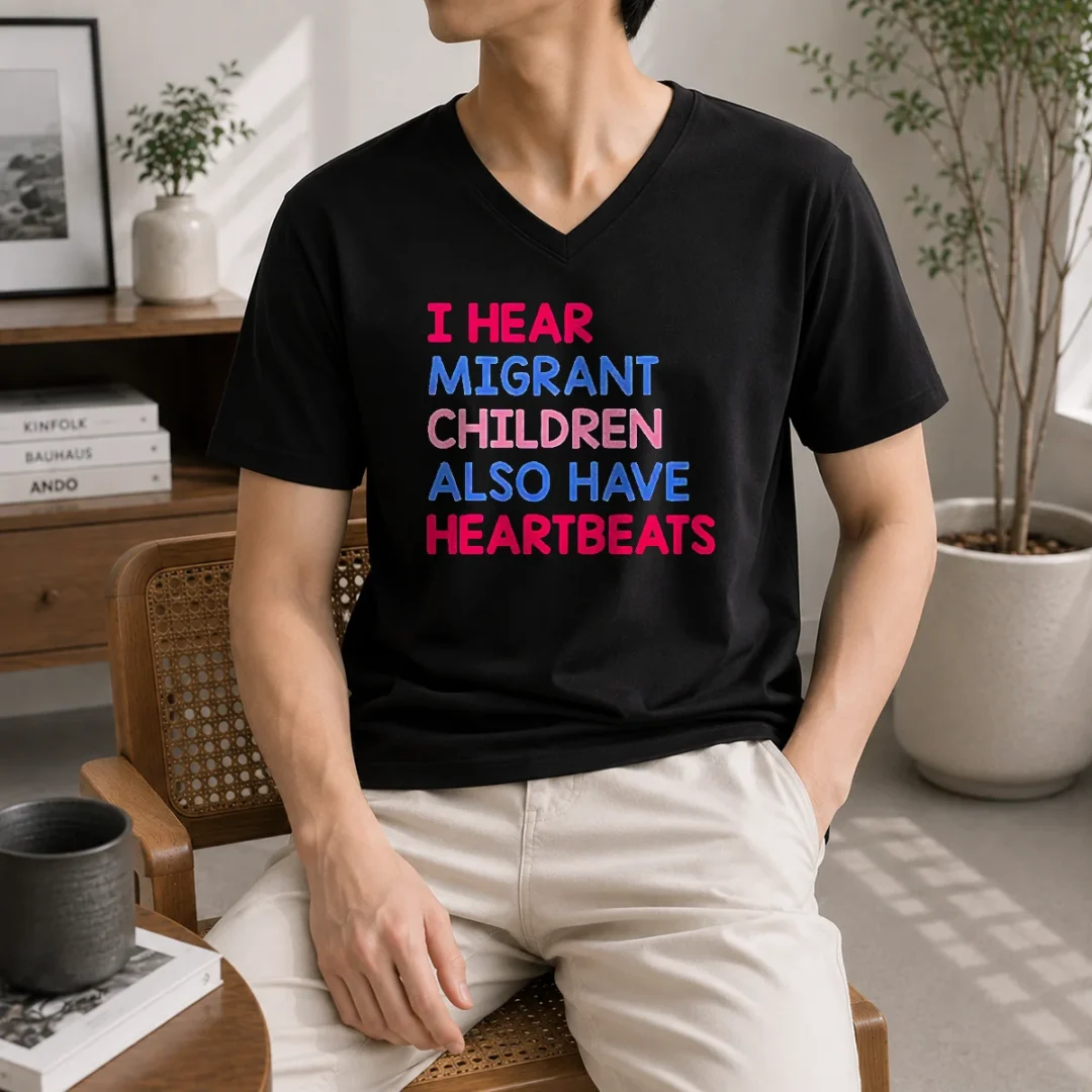 awesome-i-hear-migrant-children-also-have-heartbeats-v-neck-shirt Awesome I Hear Migrant Children Also Have Heartbeats V Neck Shirt in dark color, soft fabric with a comfortable fit