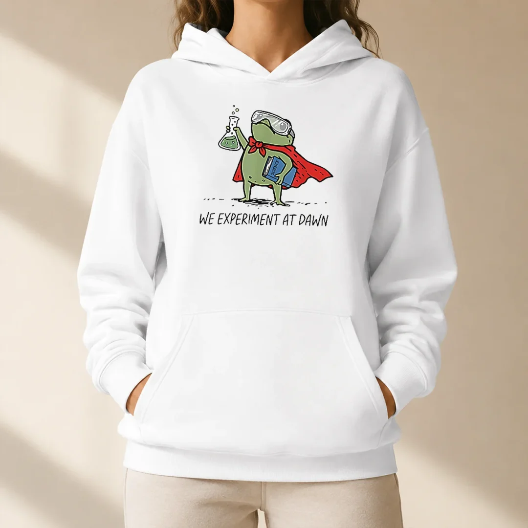 awesome-science-frog-we-experiment-at-dawn-hoodie Awesome Science Frog We Experiment At Dawn Hoodie featuring a green frog graphic and bold text on a comfortable pullover hoodie