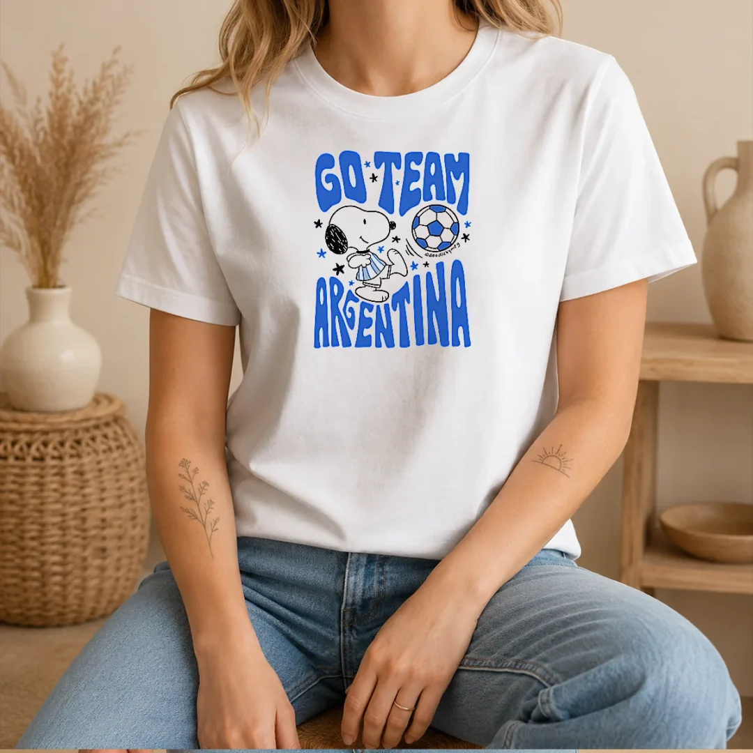 awesome-snoopy-go-team-argentina-world-cup-2026-t-shirt-1 Awesome Snoopy Go Team Argentina World Cup 2026 t shirt featuring Snoopy in Argentina colors on a white cotton tee