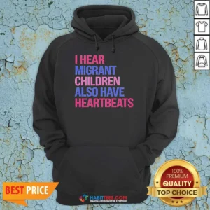 Official I Hear Migrant Children Also Have Heartbeats Bold Statement Text Hoodie in a comfortable pullover style with front pocket