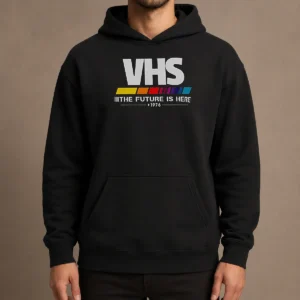 Top Pretty VHS The Future Is Here Hoodie in black, featuring a retro VHS tape graphic on the front