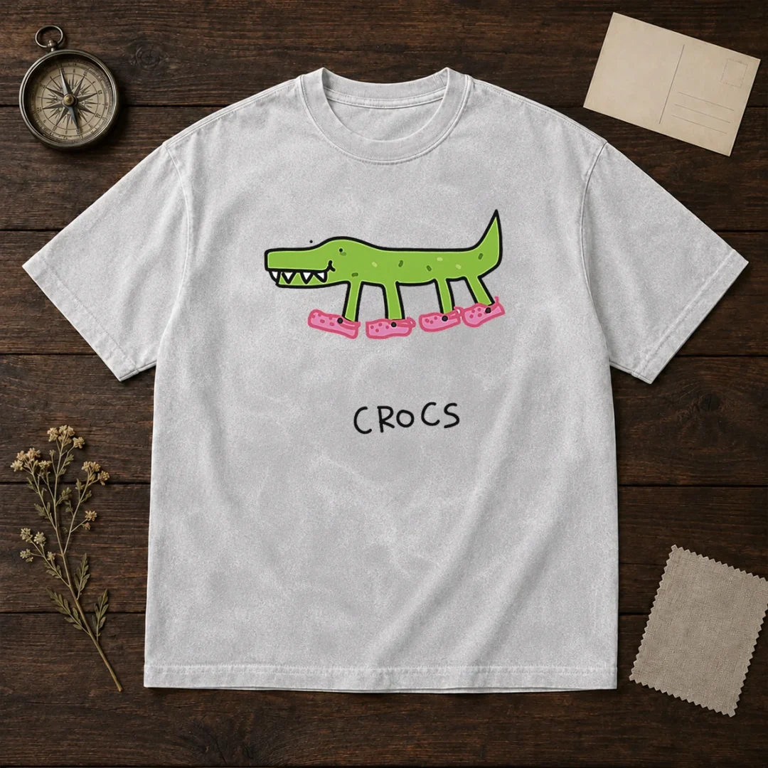 funny-crocs-crocodile-wearing-pink-shoes-drawing-washed-t-shirt Funny Crocs Crocodile Wearing Pink Shoes Drawing on a soft washed t shirt in light gray