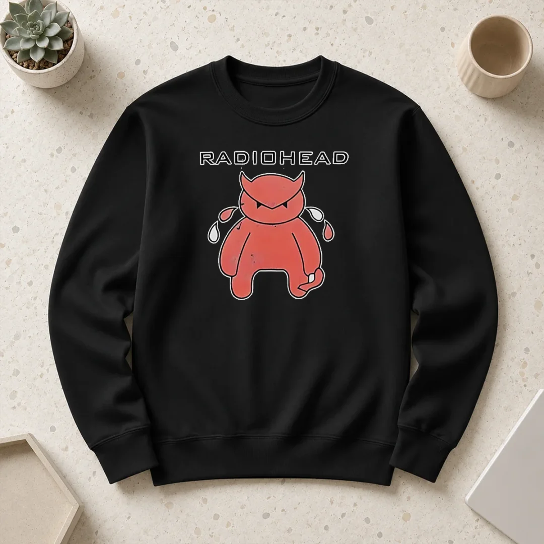 funny-radiohead-distressed-crying-devil-character-sweater Funny Radiohead Distressed Crying Devil Character Sweater featuring a unique distressed devil graphic on a cozy crewneck sweatshirt