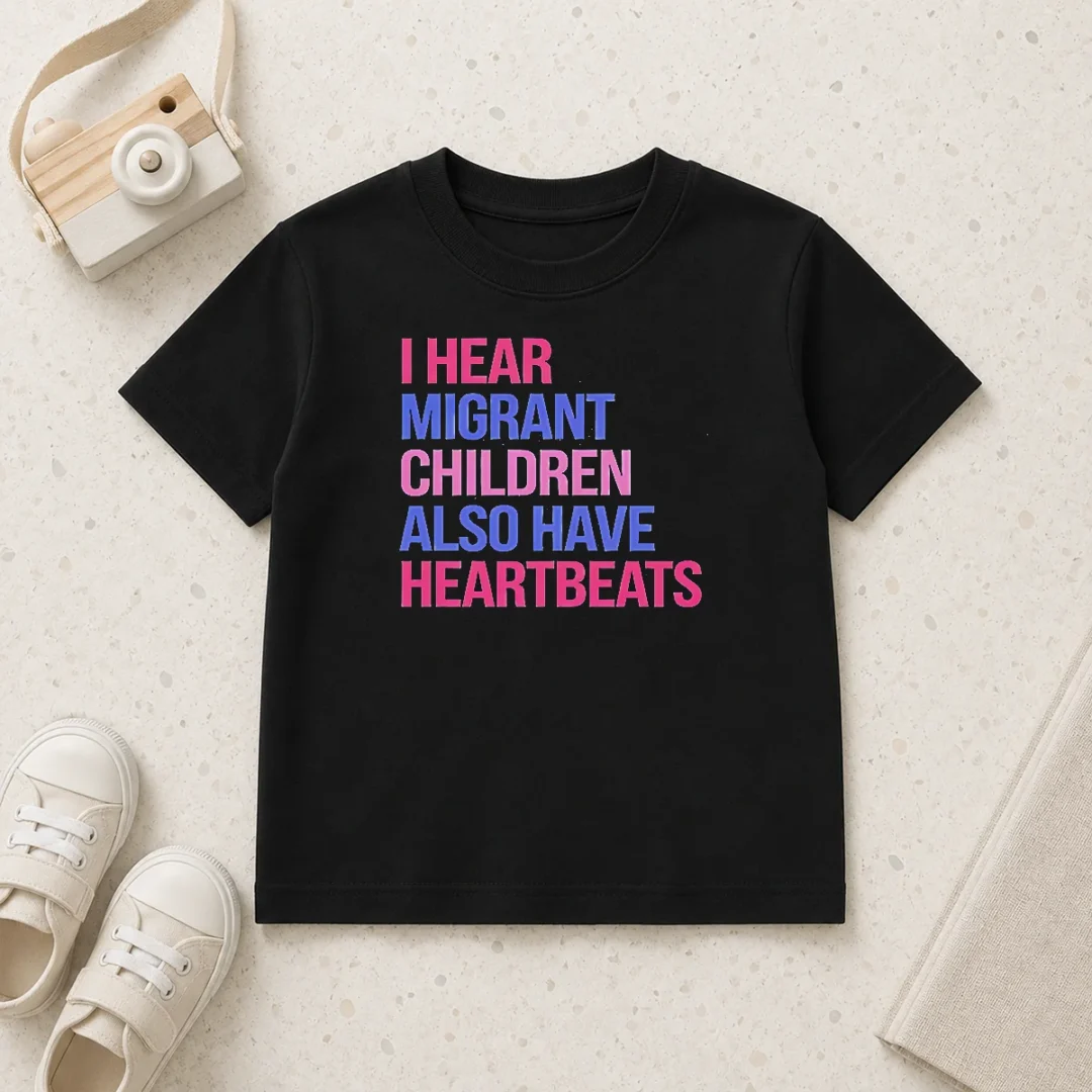 good-i-hear-migrant-children-also-have-heartbeats-bold-statement-text-kids-t-shirt Good I Hear Migrant Children Also Have Heartbeats Bold Statement Text Kids T-Shirt