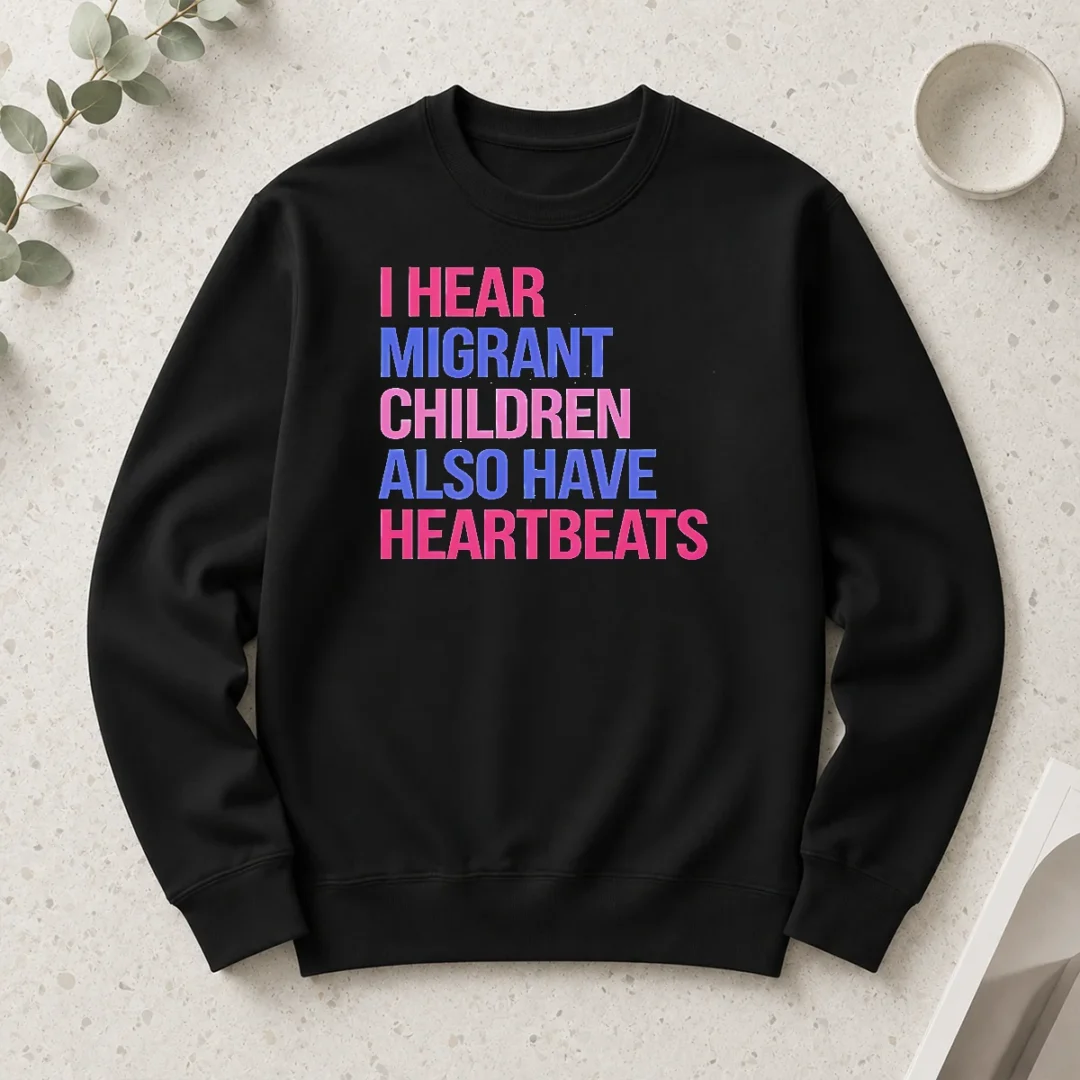 good-i-hear-migrant-children-also-have-heartbeats-bold-statement-text-long-sleeve-shirt Good I Hear Migrant Children Also Have Heartbeats Bold Statement Text Shirt - Image 6