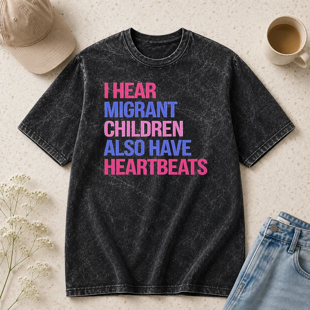 good-i-hear-migrant-children-also-have-heartbeats-bold-statement-text-washed-t-shirt Good I Hear Migrant Children Also Have Heartbeats Bold Statement Text printed on a soft washed t shirt in light gray