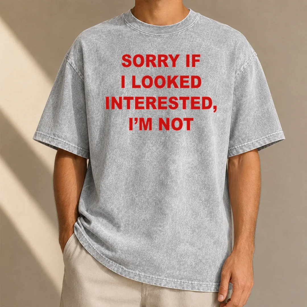 good-sorry-if-i-looked-interested-i-m-not-bold-capitalized-statement-quote-washed-t-shirt Good Sorry If I Looked Interested I'M Not Bold Capitalized Statement Quote printed on a soft washed t shirt in neutral color