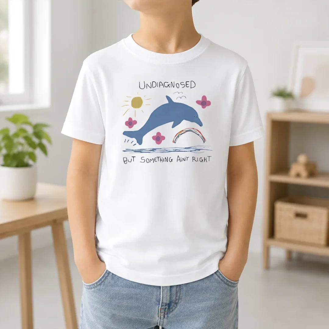 Happy Funny Dolphin Jumping Undiagnosed But Something Ain'T Right Kids T Shirt Happy Funny Dolphin Jumping Undiagnosed But Something Ain't Right Kids T Shirt in bright blue, short-sleeve cotton tee for children