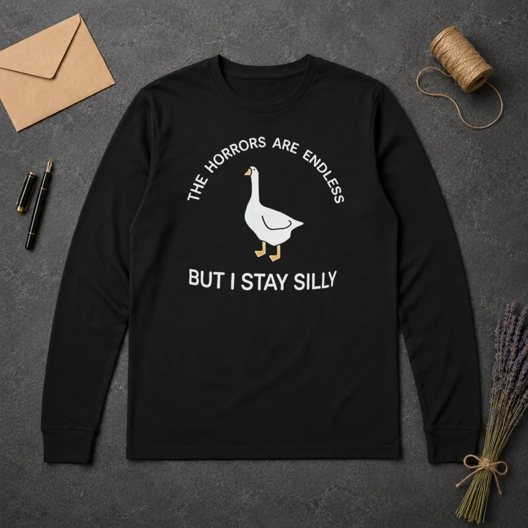 Hot Goose The Horrors Are Endless But I Stay Silly Long Sleeve Shirt Hot Goose The Horrors Are Endless But I Stay Silly long sleeve shirt in black, featuring bold graphic text on front