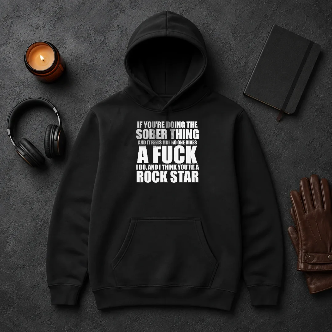 Hot If You'Re Doing The Sober Thing And It Feels Like No One Gives A F Keep The Plug In The Jug I Do Hoodie Hot If You'Re Doing The Sober Thing And It Feels Like No One Gives A F Keep The Plug In The Jug I Do Hoodie in black, front view with bold text design