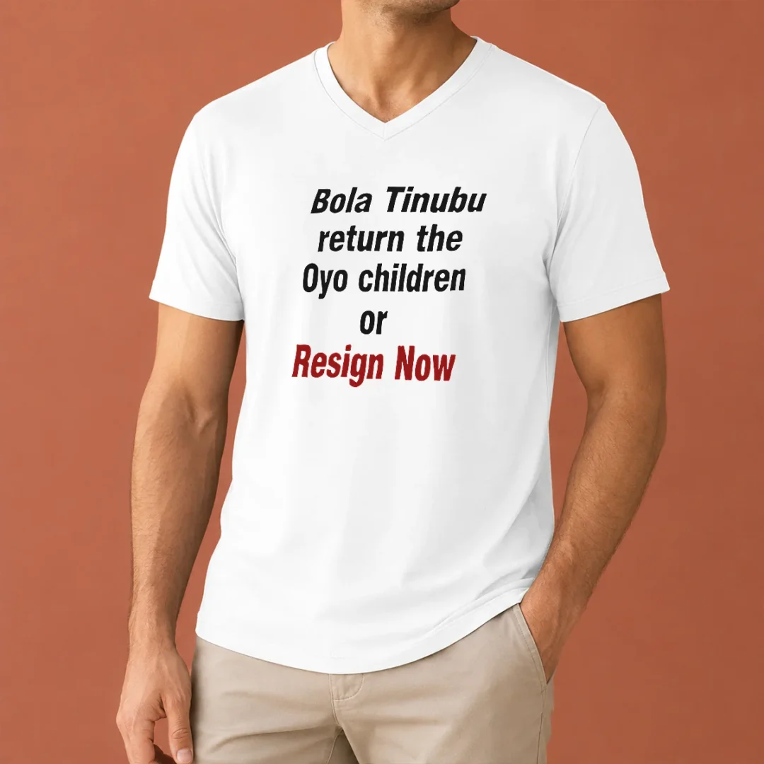 hot-original-bola-tinubu-return-the-oyo-children-or-resign-now-v-neck-shirt Hot Original Bola Tinubu Return The Oyo Children Or Resign Now V Neck Shirt in white, featuring bold political statement text
