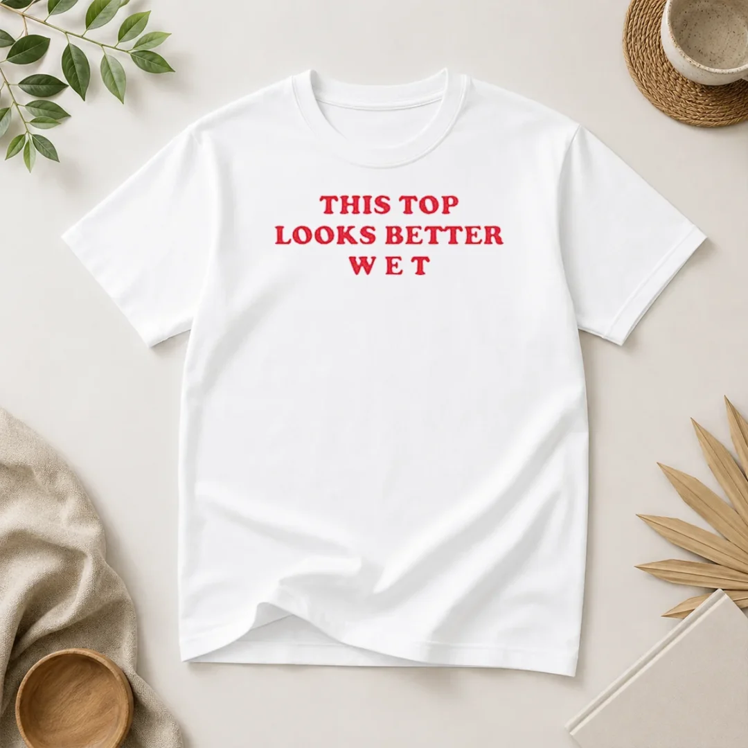 hot-this-top-looks-better-wet-t-shirt Hot This Top Looks Better Wet t shirt in white, displayed on a mannequin showing front print design