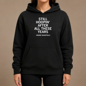 Hot Good Still Hoopin After All These Years Granny Basketball Hoodie in black, front view with kangaroo pocket and drawstring hood