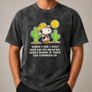 Nice Snoopy Cowboy When I Die I May Not Go To Heaven printed on a soft washed t shirt in faded black