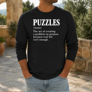 Premium Puzzles The Art Of Creating Problems Long Sleeve Shirt in black with white text design