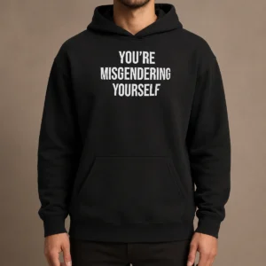 Awesome Premium You'Re Misgendering Yourself Hoodie in black with bold white text on front