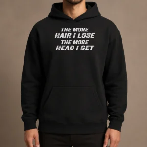 Official The More Hair I Lose The More Head I Get Bold Statement Text Hoodie in black, front view with bold white lettering