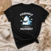 Nice Shark Grinning Friendly Until Hungry t shirt showing front graphic design on a classic crew neck cotton tee