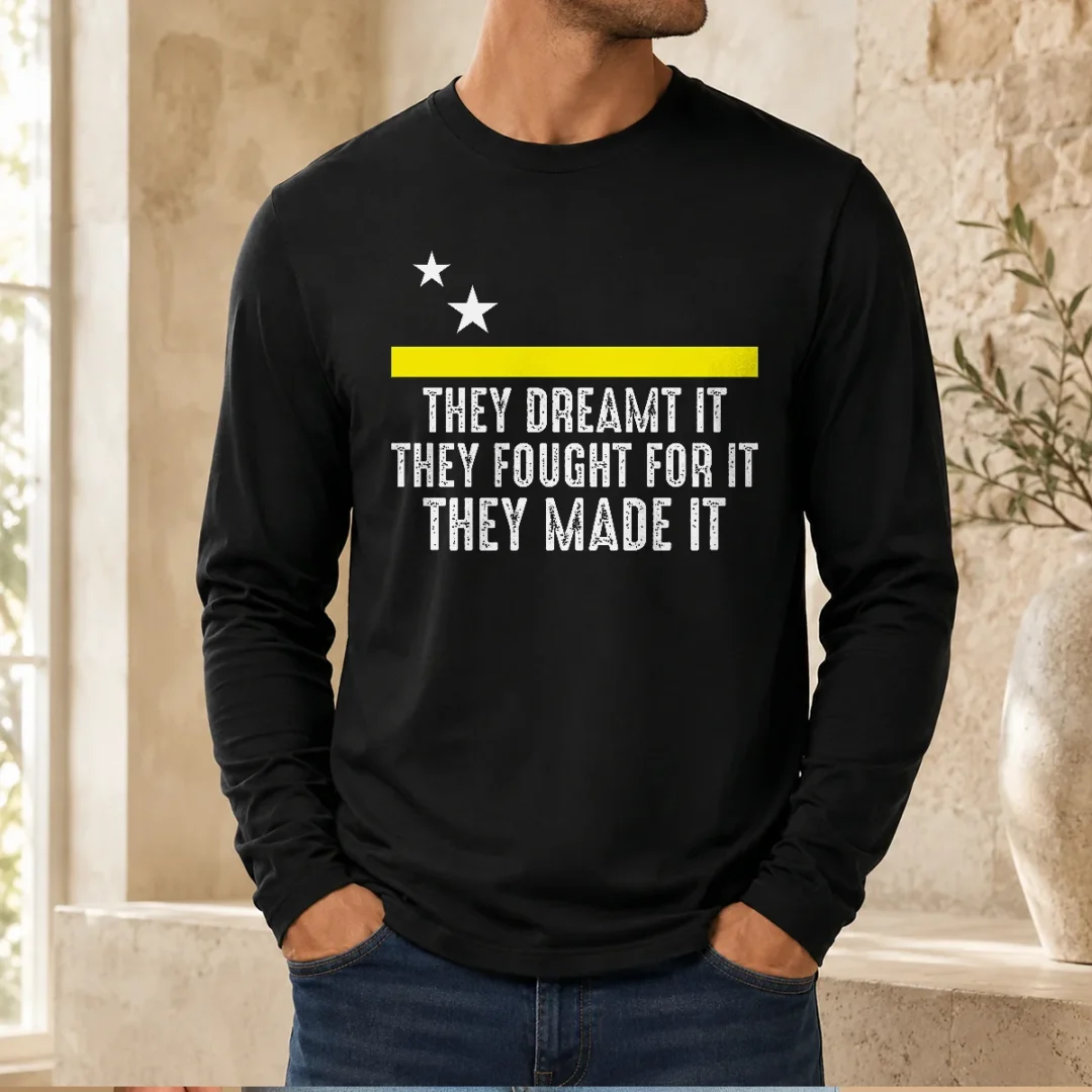 official-funny-uracao-flag-they-dreamed-it-fought-for-it-long-sleeve-shirt Official Funny Uracao Flag They Dreamed It Fought For It Long Sleeve Shirt in black with bold text and flag graphic
