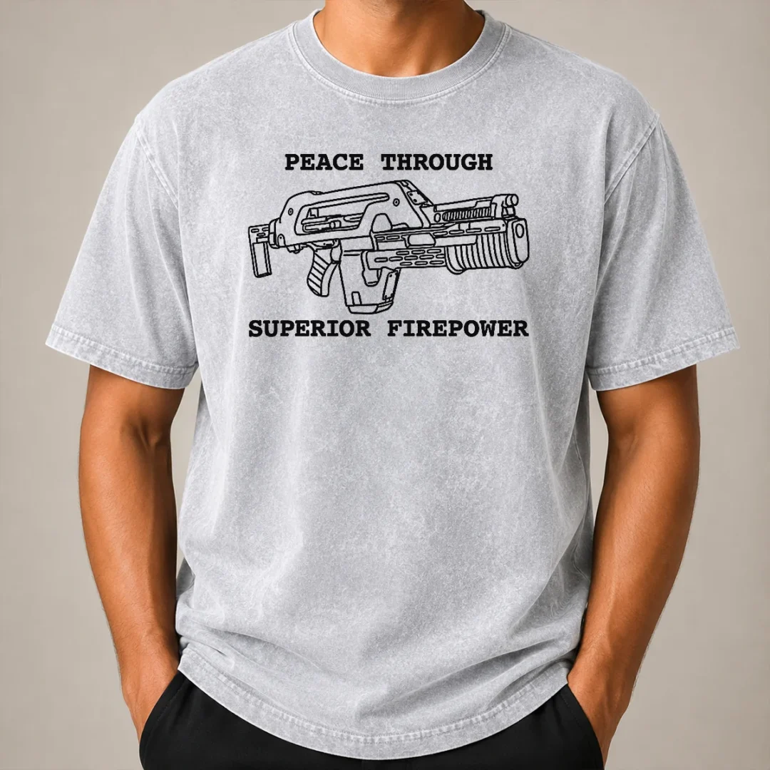 Official Peace Through Superior Firepower Washed T Shirt Official Peace Through Superior Firepower Washed T Shirt in soft, faded fabric with printed graphic