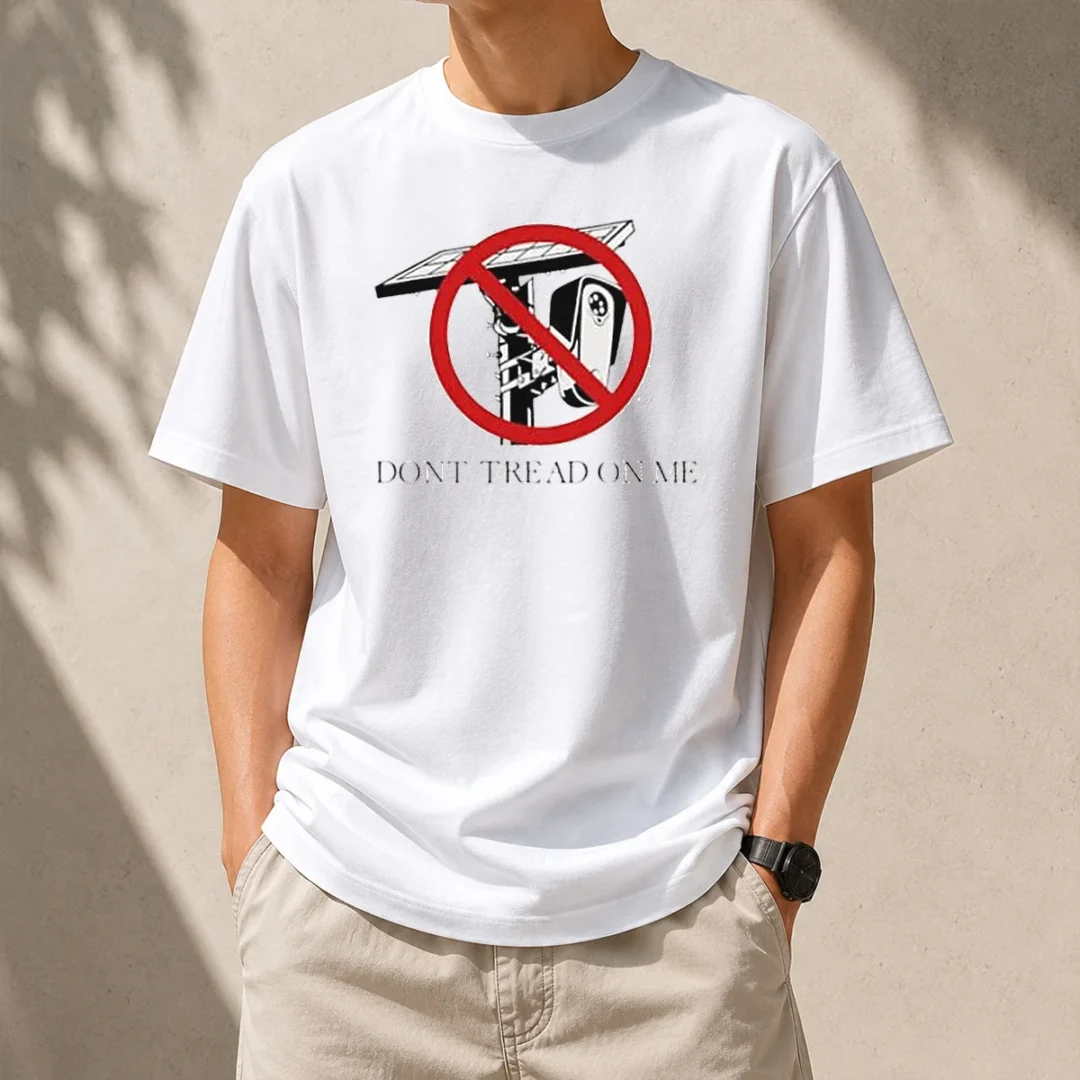 official-surveillance-camera-solar-power-gadsden-flag-dont-tread-on-me-libertarian-t-shirt-1 Official Surveillance Camera Solar Power Gadsden Flag DONT TREAD ON ME Libertarian t shirt in black, featuring bold graphic design