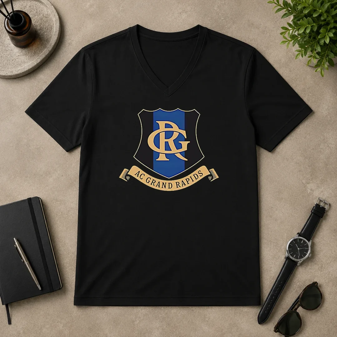 Original AC Grand Rapids Logo Applique V Neck Original AC Grand Rapids Logo Applique V Neck Shirt in dark color featuring embroidered logo on chest
