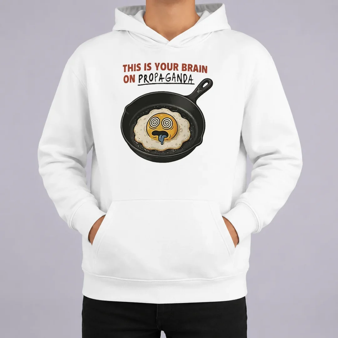 Original Fried Egg This Is Your Brain On Propaganda Hoodie Original Fried Egg This Is Your Brain On Propaganda Hoodie in black with front graphic print and drawstring hood