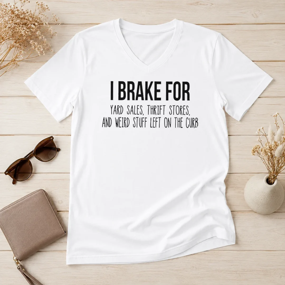 original-hot-i-brake-for-yard-sales-thrift-stores-and-weird-stuff-left-on-the-curb-v-neck-shirt-2 Original Hot I Brake For Yard Sales Thrift Stores And Weird Stuff Left On The Curb V Neck Shirt in heather gray, front view