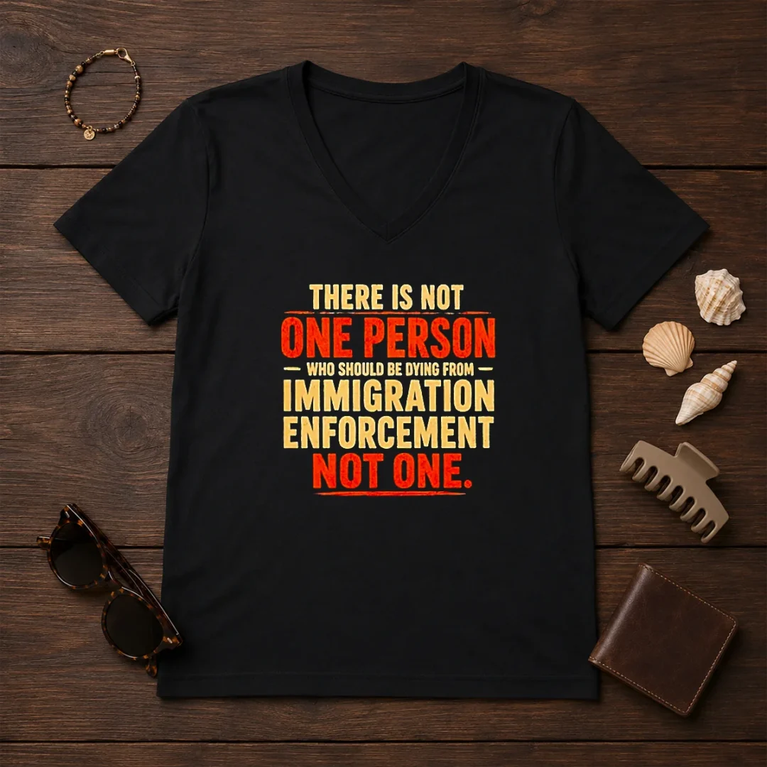 original-there-is-not-one-person-who-should-be-dying-from-immigration-enforcement-v-neck Original There Is Not One Person WHO Should Be Dying From Immigration Enforcement V Neck Shirt in black, front view with short sleeves