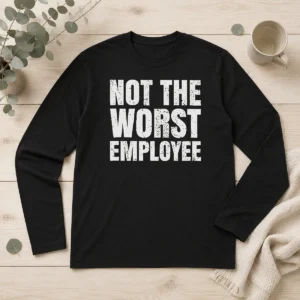 Good Not The Worst Employee Work Long Sleeve Shirt in black, showing front graphic and ribbed cuffs