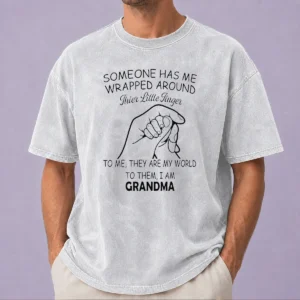 Funny Someone Has Me Wrapped Around Their Little Finger Grandma printed on a soft washed t shirt in light color