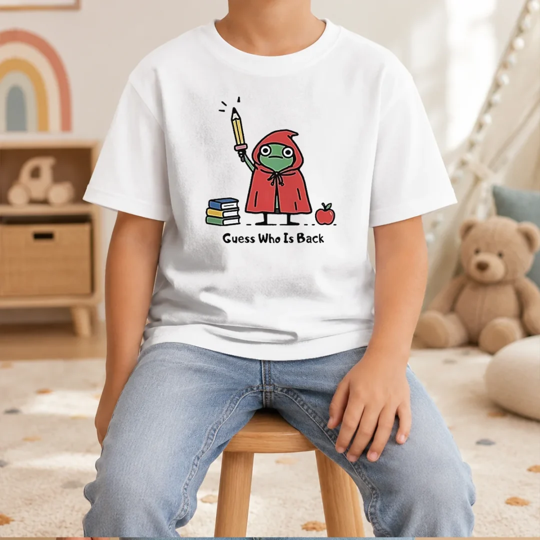 premium-guess-who-is-back-frog-with-pencil-and-books-kids-t-shirt Premium Guess WHO Is Back Frog With Pencil And Books Kids T-Shirt
