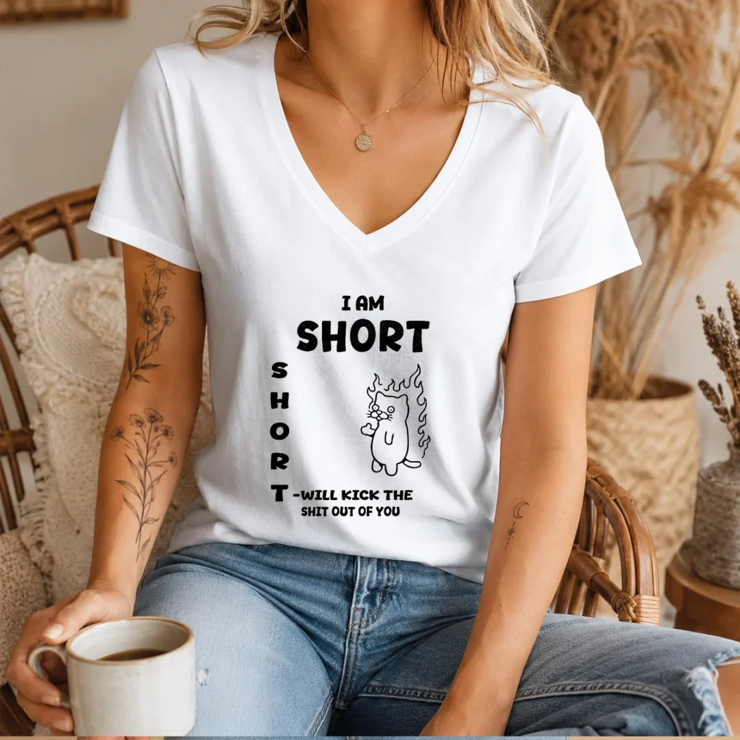 premium-i-am-short-short-will-kick-the-shit-out-of-you-cat-v-neck-shirt Premium I Am Short Short Will Kick The Shit Out Of You Cat V Neck Shirt in black, featuring bold cat graphic and playful text design