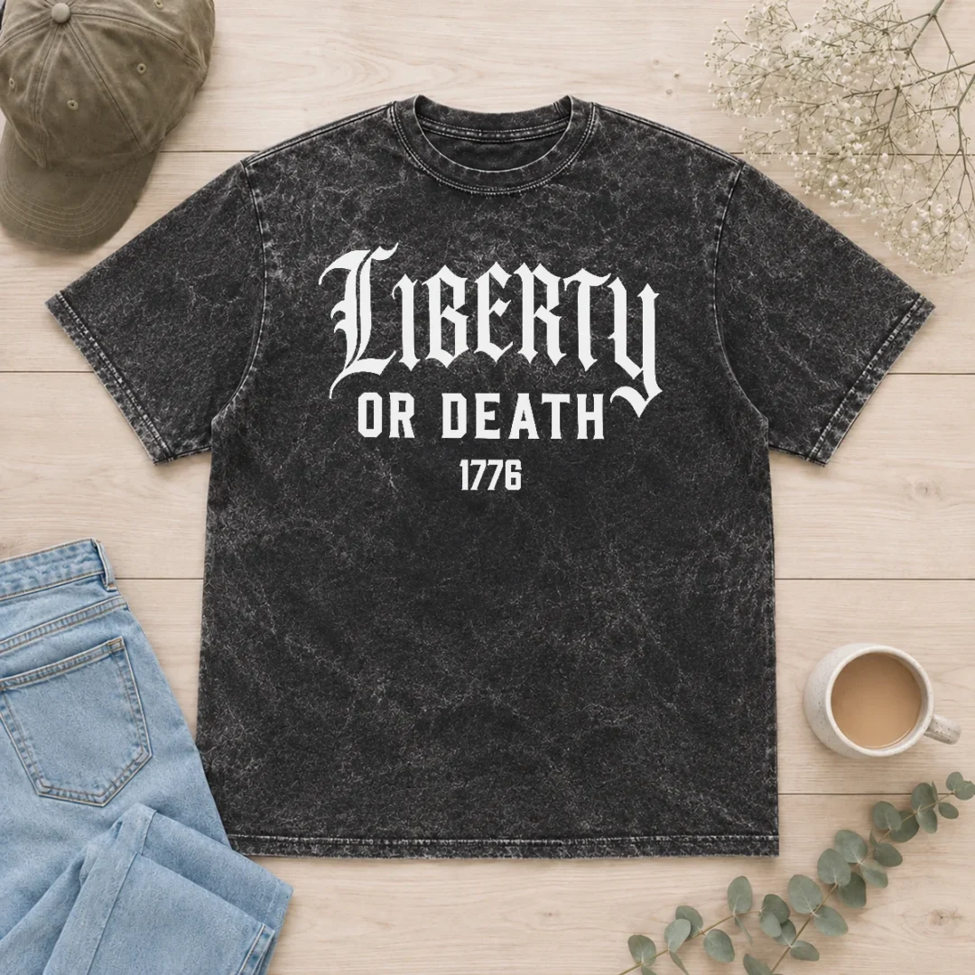 premium-liberty-or-death-1776-patriotic-quote-washed-t-shirt Premium Liberty Or Death 1776 Patriotic Quote washed t shirt in faded navy blue, featuring vintage patriotic text