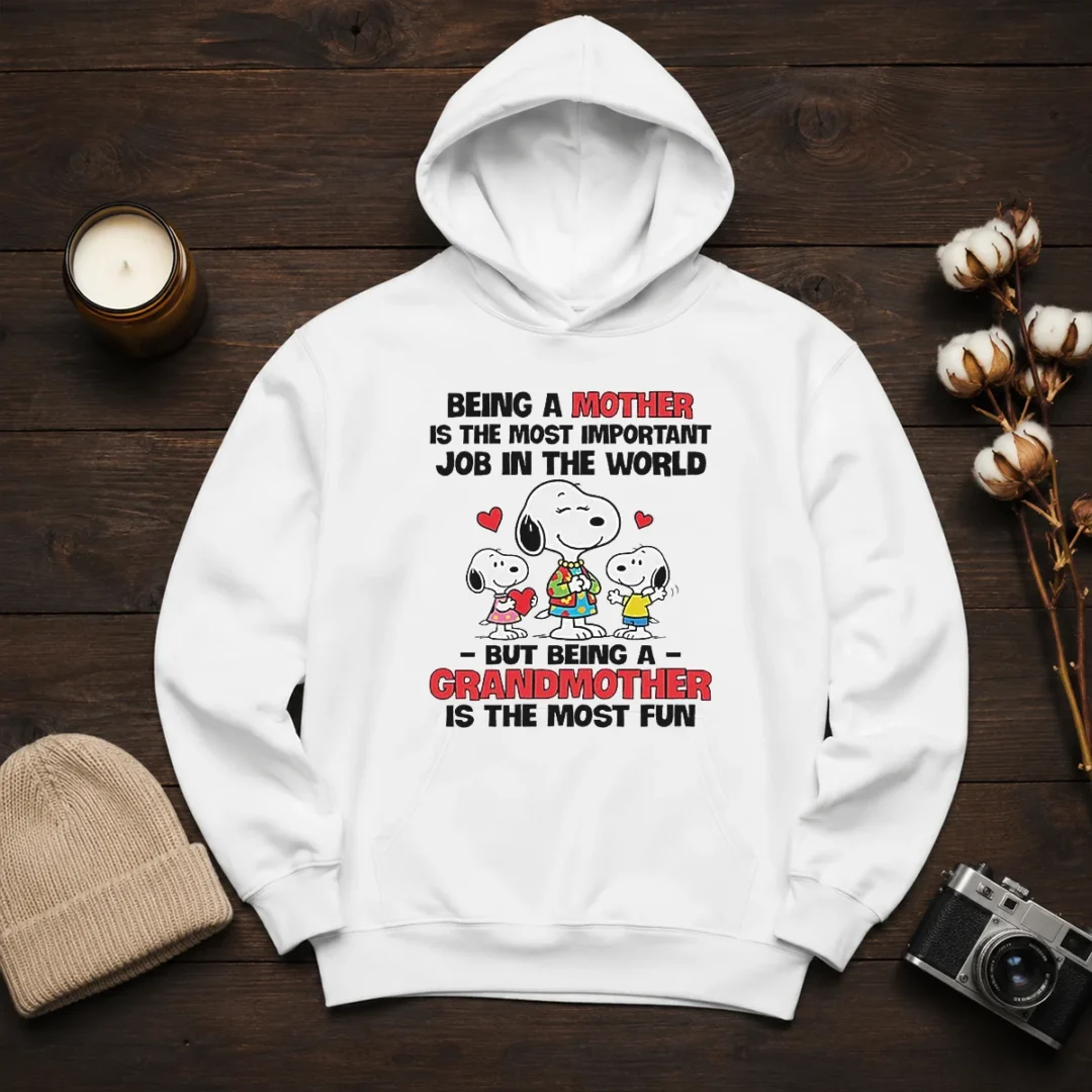 premium-snoopy-peanuts-being-a-mother-is-the-most-important-job-but-being-a-grandmother-hoodie Premium Snoopy Peanuts Being A Mother Is The Most Important Job But Being A Grandmother Hoodie in soft cotton fabric with front pocket and drawstring hood
