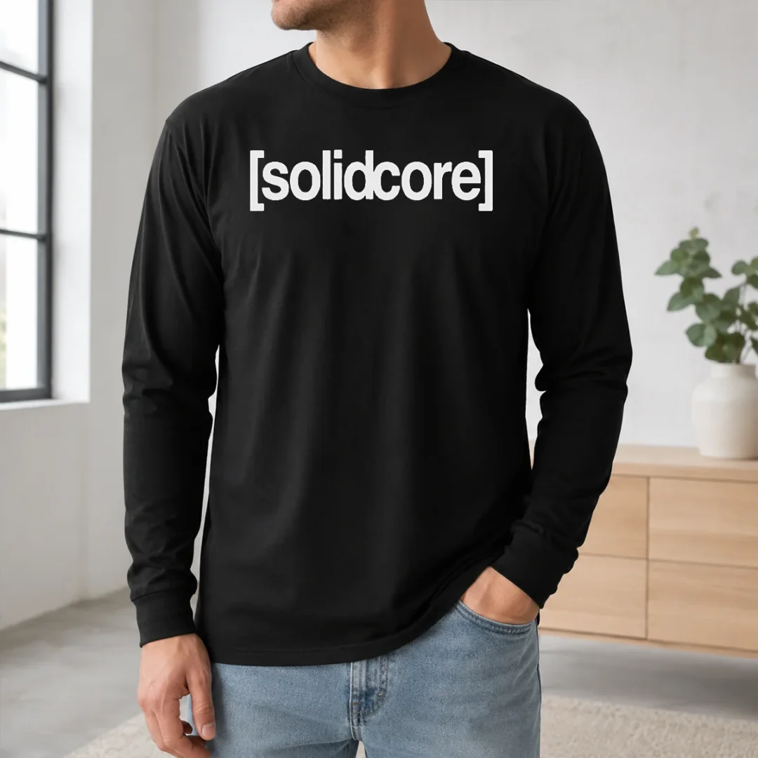 Premium Solidcore Merch Logo Long Sleeve Shirt Premium Solidcore Merch Logo long sleeve shirt in black with white logo on front, displayed on a flat lay