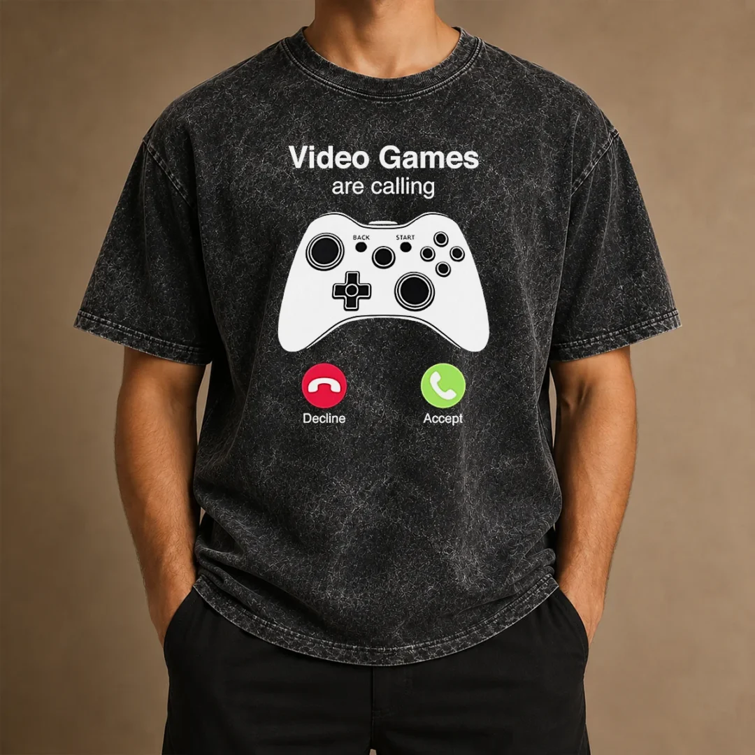 premium-video-games-are-calling-gaming-controller-phone-screen-washed-t-shirt Premium Video Games Are Calling Gaming Controller Phone Screen printed on a soft washed t shirt in dark gray