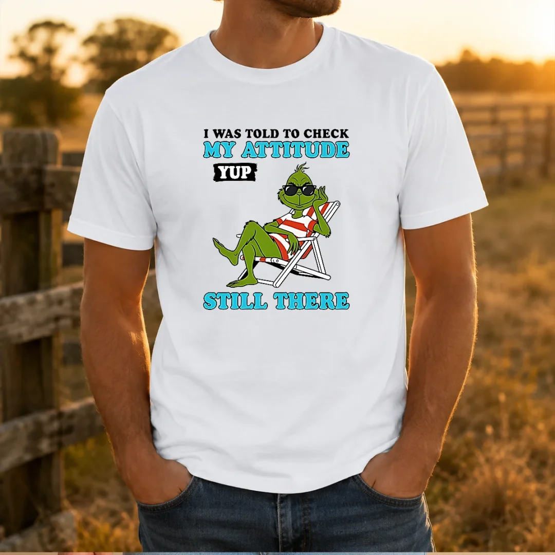 pretty-grinch-i-was-told-to-check-my-attitude-yup-still-there-t-shirt Pretty Grinch I Was Told To Check My Attitude Yup Still There t shirt with bold text graphic on front