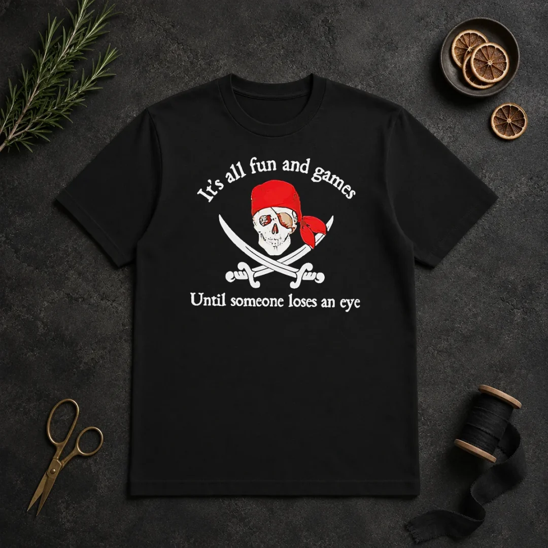 Pretty It'S All Fun And Games Until Someone Loses An Eye Pirate Skull T Shirt Pretty It'S All Fun And Games Until Someone Loses An Eye Pirate Skull t shirt in black, front view with bold pirate skull graphic