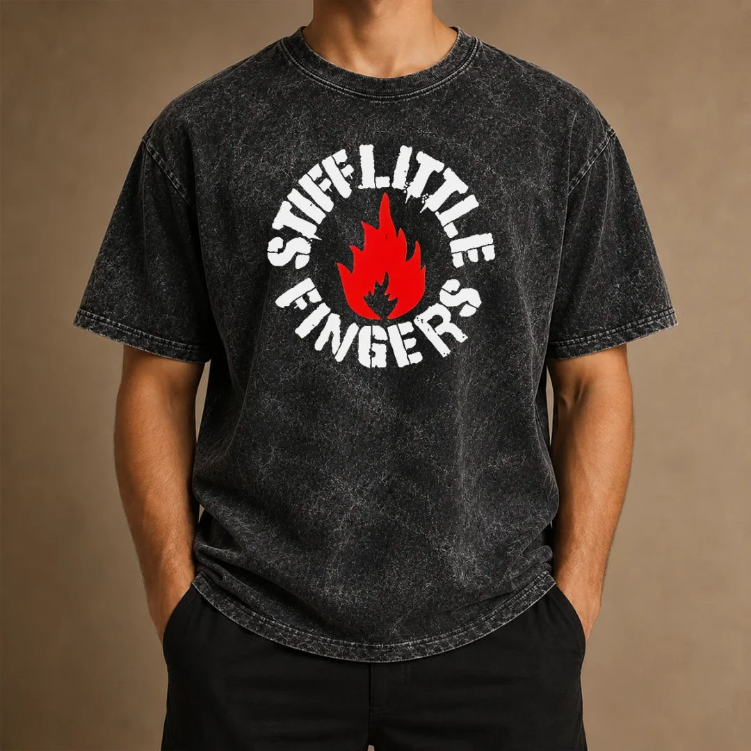 pretty-stiff-little-fingers-circular-badge-logo-with-flame-emblem-centered-inside-washed-t-shirt Pretty Stiff Little Fingers Circular Badge Logo With Flame Emblem Centered Inside on a washed cotton t shirt in a faded black color