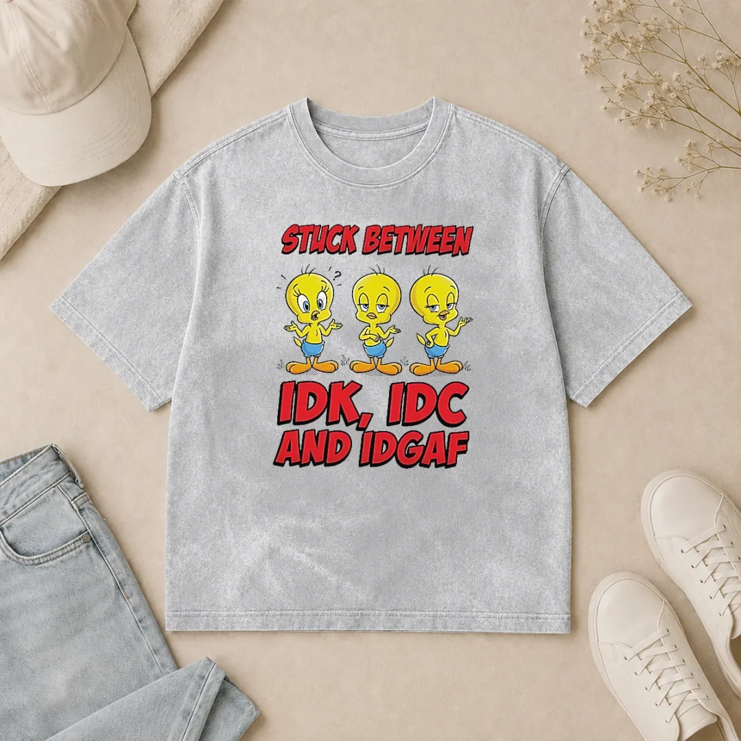 Pretty Tweety Stuck Between IDK IDC And IDGAF Washed T Shirt Pretty Tweety Stuck Between IDK IDC And IDGAF Washed T Shirt in soft cotton with faded vintage look