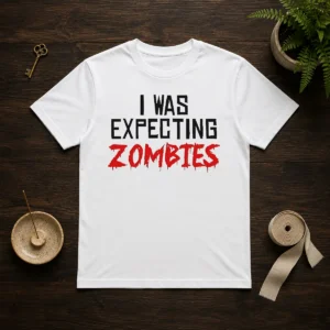 Original I Was Expecting Zombies t shirt in black, featuring bold white text design on front