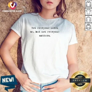 Premium Not Everyone Likes Me But Not Everyone Matters V Neck Shirt in dark color with clear white text design