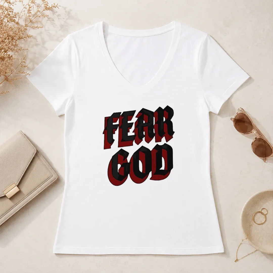 Top Fear God Script Print Faith Inspired Minimalist Religious Statement V Neck Shirt Top Fear God Script Print Faith Inspired Minimalist Religious Statement V Neck Shirt in black fabric with white lettering